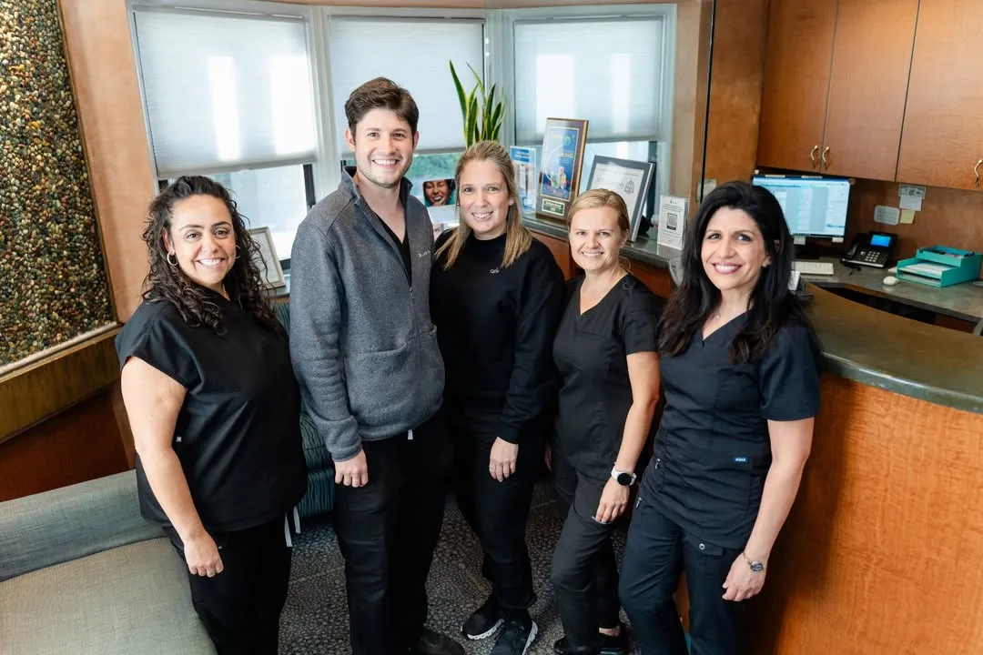 The Infinity Dental Wellness team in the Fort Lee, NJ office lobby